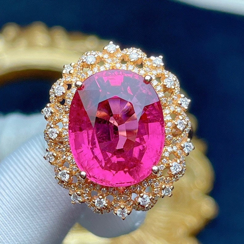 14k Gold 11.05 Ct Natural Tourmaline & Diamond Ring: Ref:231124114 // gold content:14k gold // ring size:7. 25us // // main gemstone:tourmaline // shape:oval // carat weight:11. 05ct // color:red // treatment:natural // // adjacent gemstone 2 :