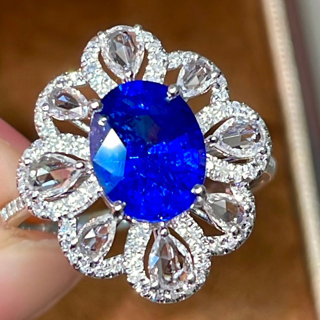 14k Gold 2.65 Ctw Vivid Blue Natural Sapphire & Diamond Ring: Ref:231124115 // gold content:14k gold // ring size:7. 25us // // main gemstone:sapphire // shape:oval // carat weight:2. 35ct // color:vivid blue // treatment:natural // // adjacent gemstone 2 :