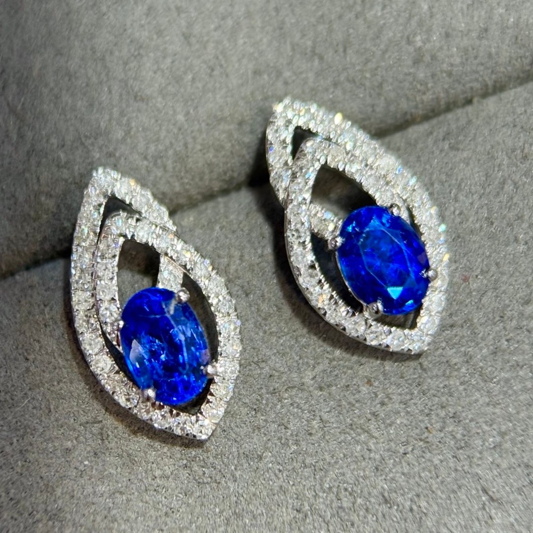 14k Gold 2.08 Ctw Vivid Blue Natural Sapphire & Diamond Earrings: Ref:231124119 // gold content:14k gold // main gemstone:sapphire // shape:oval // carat weight:1. 66ct // color:vivid blue // treatment:natural // // adjacent gemstone 2 : diamond // shape:round // ca