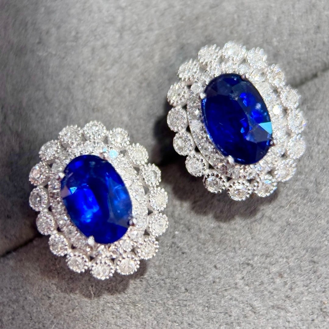 14k Gold 2.32 Ctw Vivid Blue Natural Sapphire & Diamond Earrings: Ref:231124148 // gold content:14k gold // main gemstone:sapphire // shape:oval // carat weight:1. 95ct // color:vivid blue // treatment:natural // // adjacent gemstone 2 : diamond // shape:round //