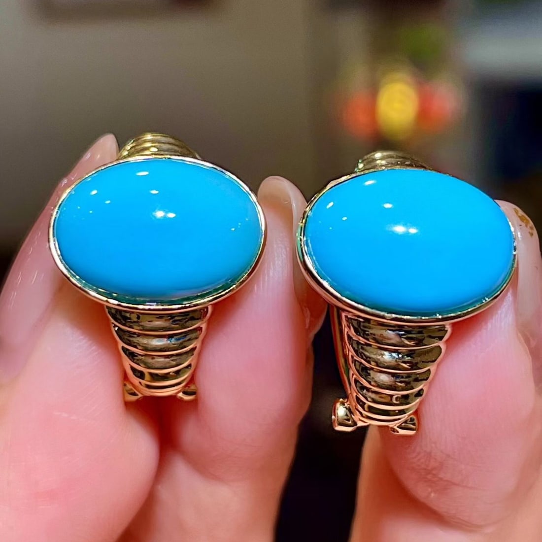 14k Gold 10.42 Ct Natural Blue Turquoise Earrings: Ref:231124164 // gold content:14k gold // main gemstone:blue turquoise // shape:oval // carat weight:10. 42ct // color:blue // treatment:natural // Condition: NewLow Estimate: 9300.00High Estimate: