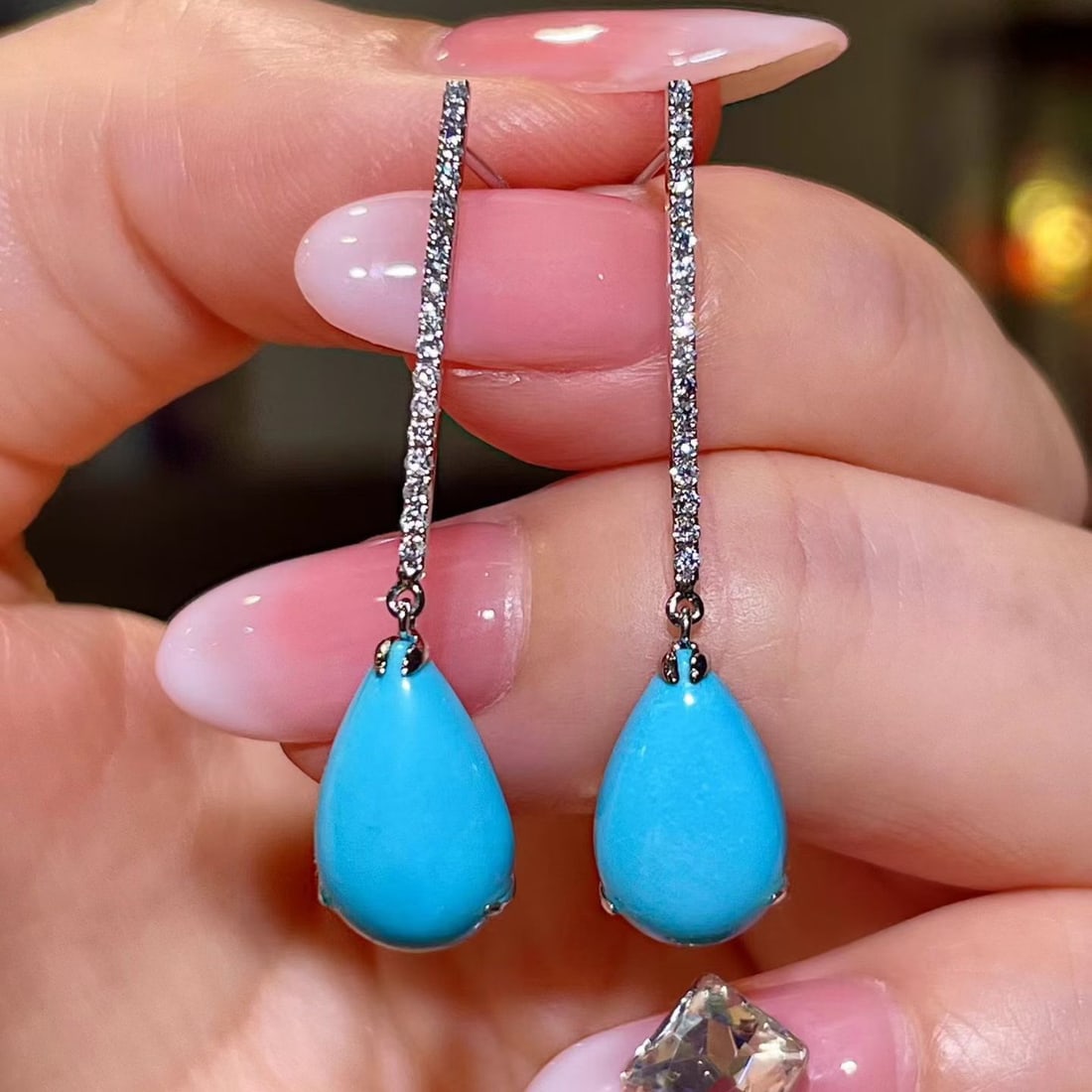 14k Gold 5.95 Ctw Natural Blue Turquoise & Diamond Earrings: Ref:231124192 // gold content:14k gold // main gemstone:blue turquoise // shape:pear // carat weight:5. 75ct // color:blue // treatment:natural // // adjacent gemstone 2 : diamond // shape:round //