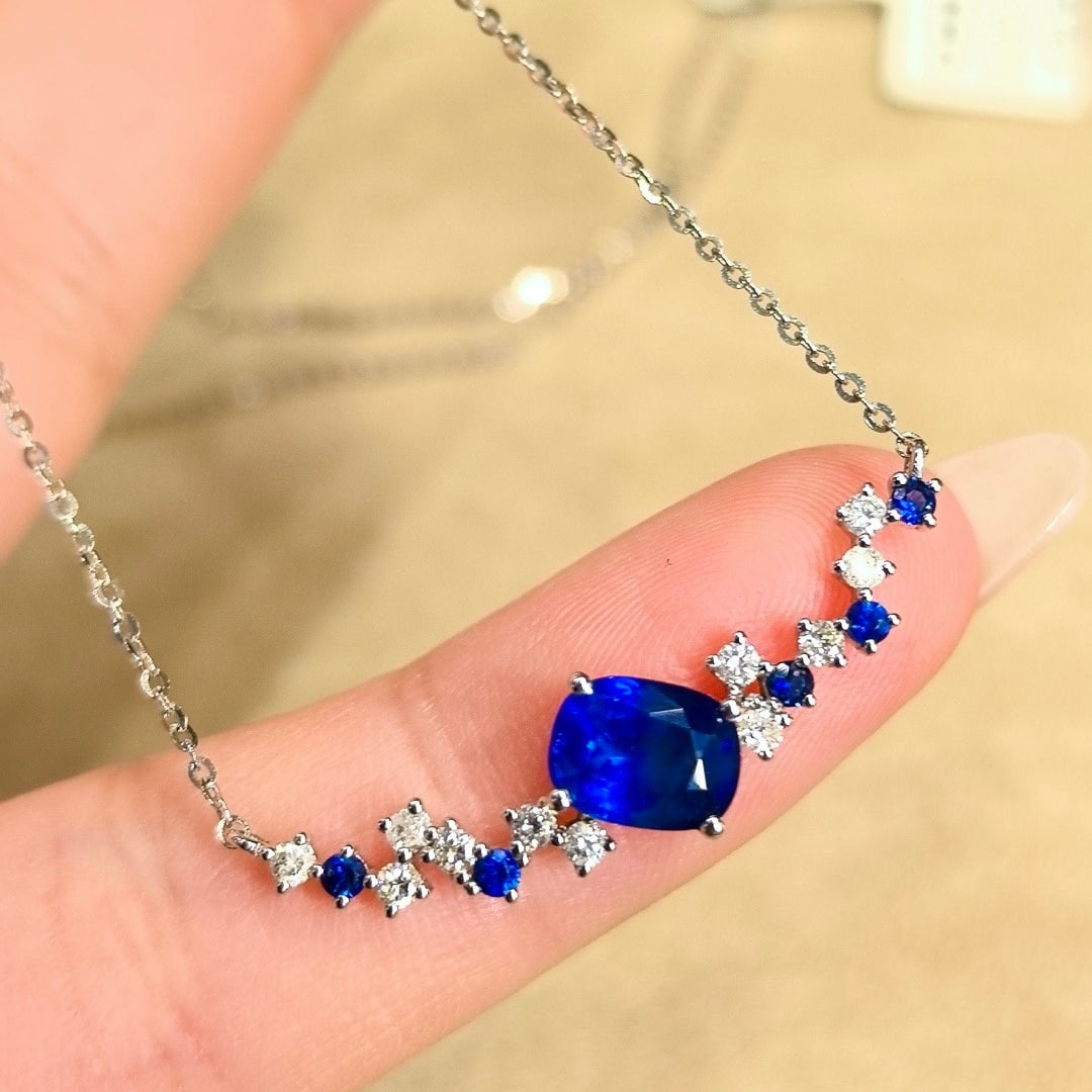 14k Gold 1.69 Ctw Natural Sapphire & Diamond Necklace: Ref:231124200 // gold content:14k gold // main gemstone:sapphire // shape:cushion // carat weight:1. 45ct // color:blue // treatment:natural // // adjacent gemstone 2 : diamond // shape:round // carat