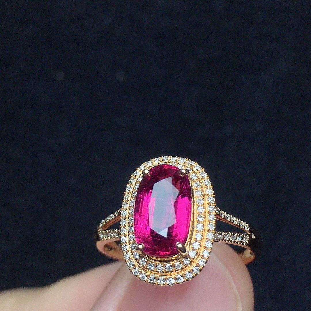 14k Gold 1.75 Ct Natural Tourmaline & Diamond Ring: Ref:231124319 // gold content:14k gold // ring size:7. 25us // // main gemstone:tourmaline // shape:oval // carat weight:1. 75ct // color:red // treatment:natural // // adjacent gemstone 2 :