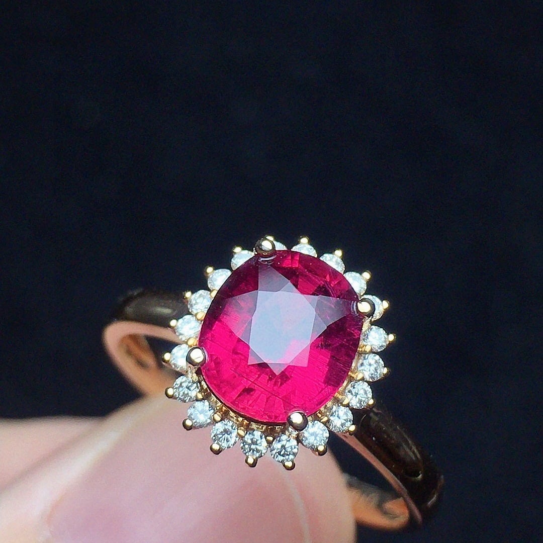 14k Gold 1.52 Ct Natural Tourmaline & Diamond Ring: Ref:231124384 // gold content:14k gold // ring size:7. 25us // // main gemstone:tourmaline // shape:oval // carat weight:1. 52ct // color:red // treatment:natural // // adjacent gemstone 2 :