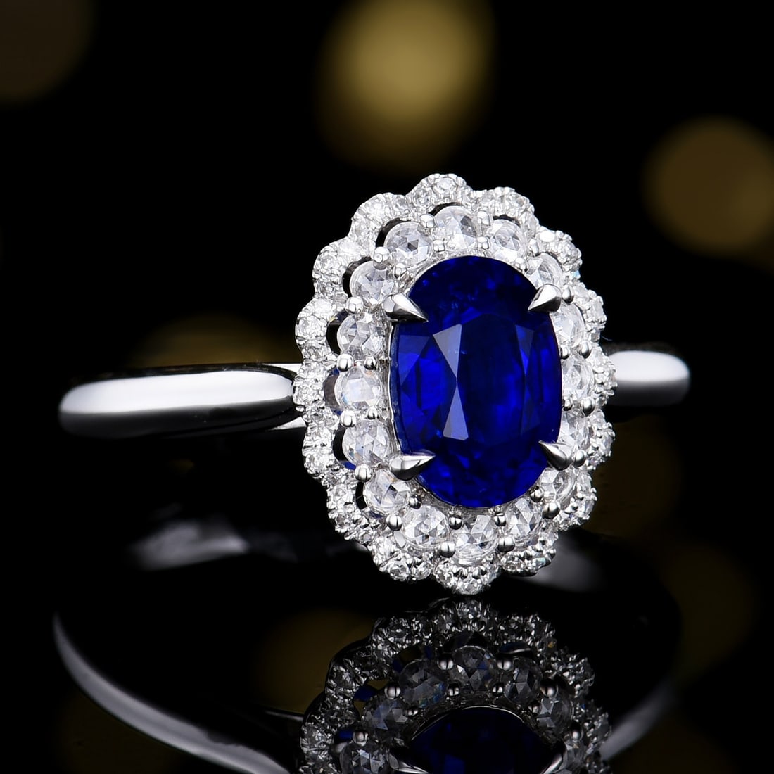 14k Gold 1.88 Ctw Vivid Blue Natural Sapphire & Diamond Ring: Ref:231124389 // gold content:14k gold // ring size:7. 25us // // main gemstone:sapphire // shape:oval // carat weight:1. 6ct // color:vivid blue // treatment:natural // // adjacent gemstone 2 :