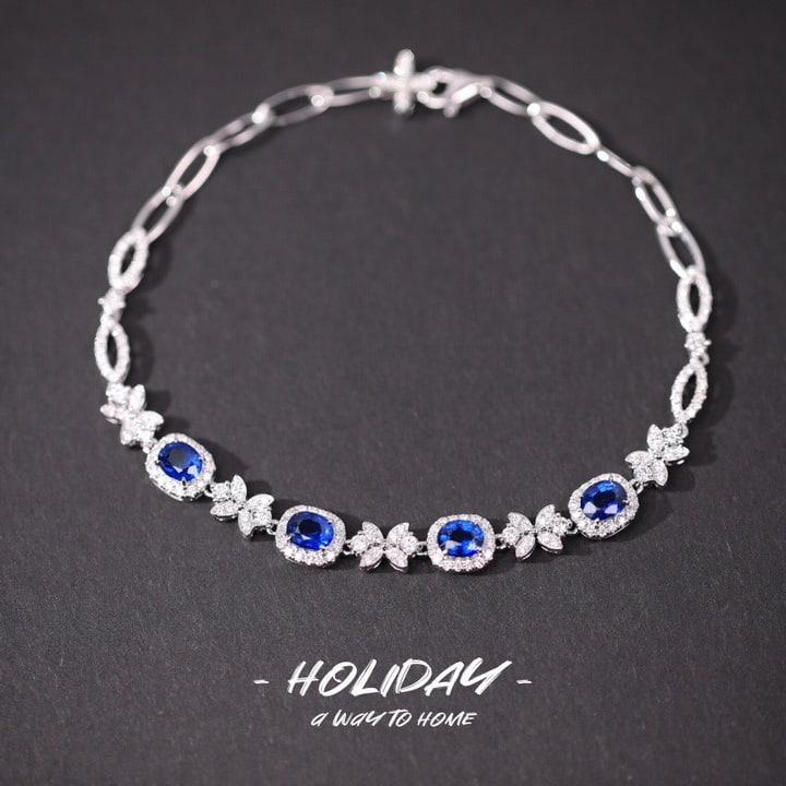 14k Gold 3.54 Ctw Natural Sapphire & Diamond Bracelet: Ref:231124428 // gold content:14k gold // main gemstone:sapphire // shape:oval // carat weight:2. 23ct // color:blue // treatment:natural // // adjacent gemstone 2 : diamond // shape:round // carat