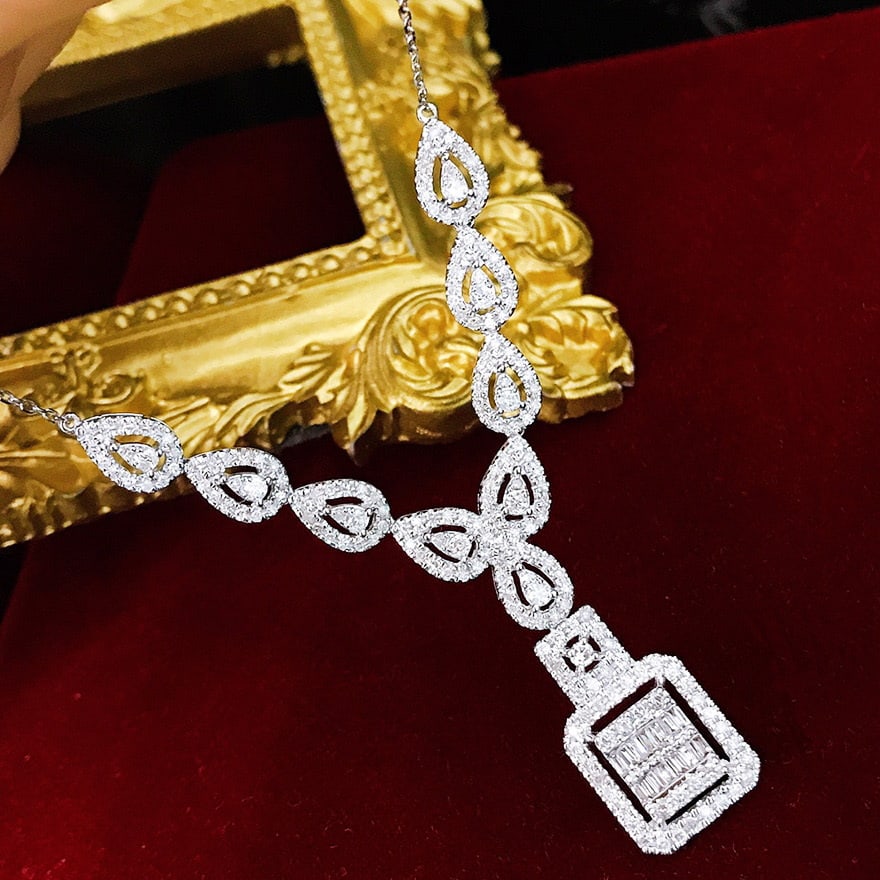 14k Gold 1.15 Ct Natural H Diamond Necklace: Ref:231067008 // gold content:14k gold // main gemstone:diamond // shape:multiple // carat weight:1. 15ct // clarity grade:vs-si // color:h // treatment:natural // Condition: NewLow Estimate: