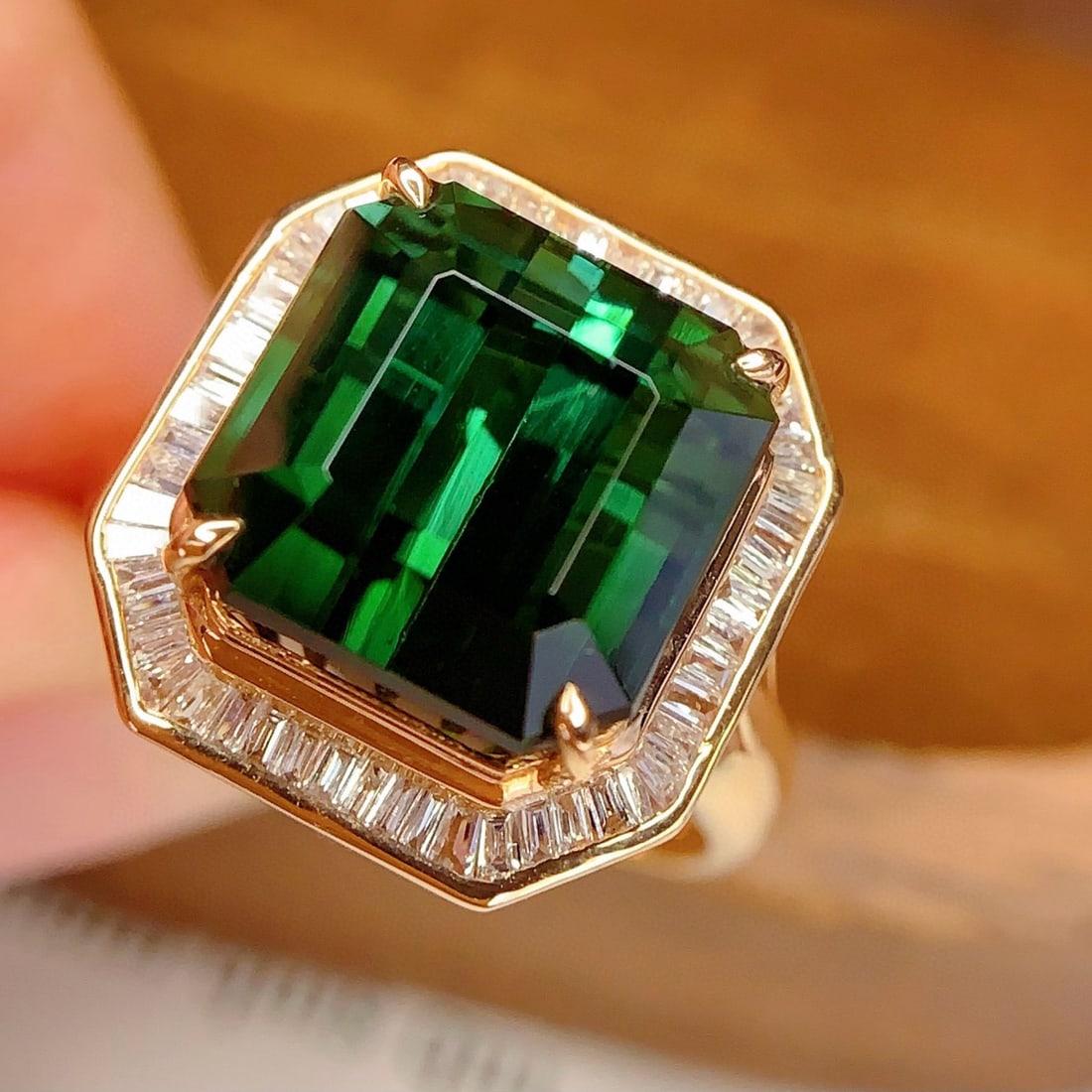 14k Gold 65.96 Ctw Natural Tourmaline & Diamond Ring: Ref:231067052 // gold content:14k gold // ring size:7. 25 us // // main gemstone:tourmaline // shape:octagonal // carat weight:8. 96ct // color:green // treatment:natural // // adjacent gemstone 2