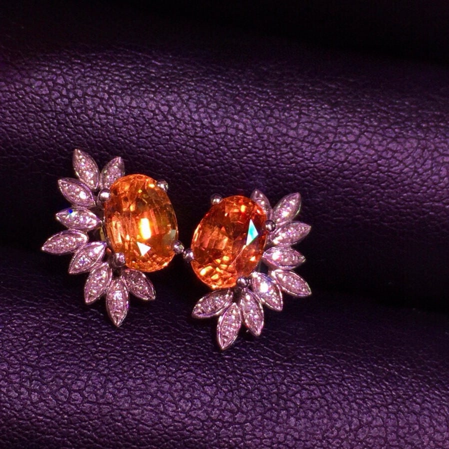 14k Gold 3.6 Ct Natural Spessartine & Diamond Earrings: Ref:231067055 // gold content:14k gold // main gemstone:spessartine // number of stones:2 // shape:oval // carat weight:3. 6ct // color:orange // treatment:natural // // adjacent gemstone 2 :