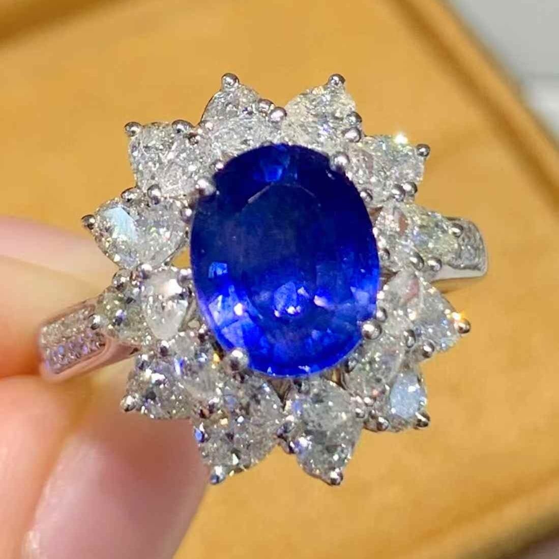 14k Gold 2.5 Ct Natural Sapphire & Diamond Ring: Ref:231067104 // gold content:14k gold // ring size:7. 25us // // main gemstone:sapphire // shape:oval // carat weight:2. 5ct // color:blue // treatment:natural // // adjacent gemstone 2 : diamond