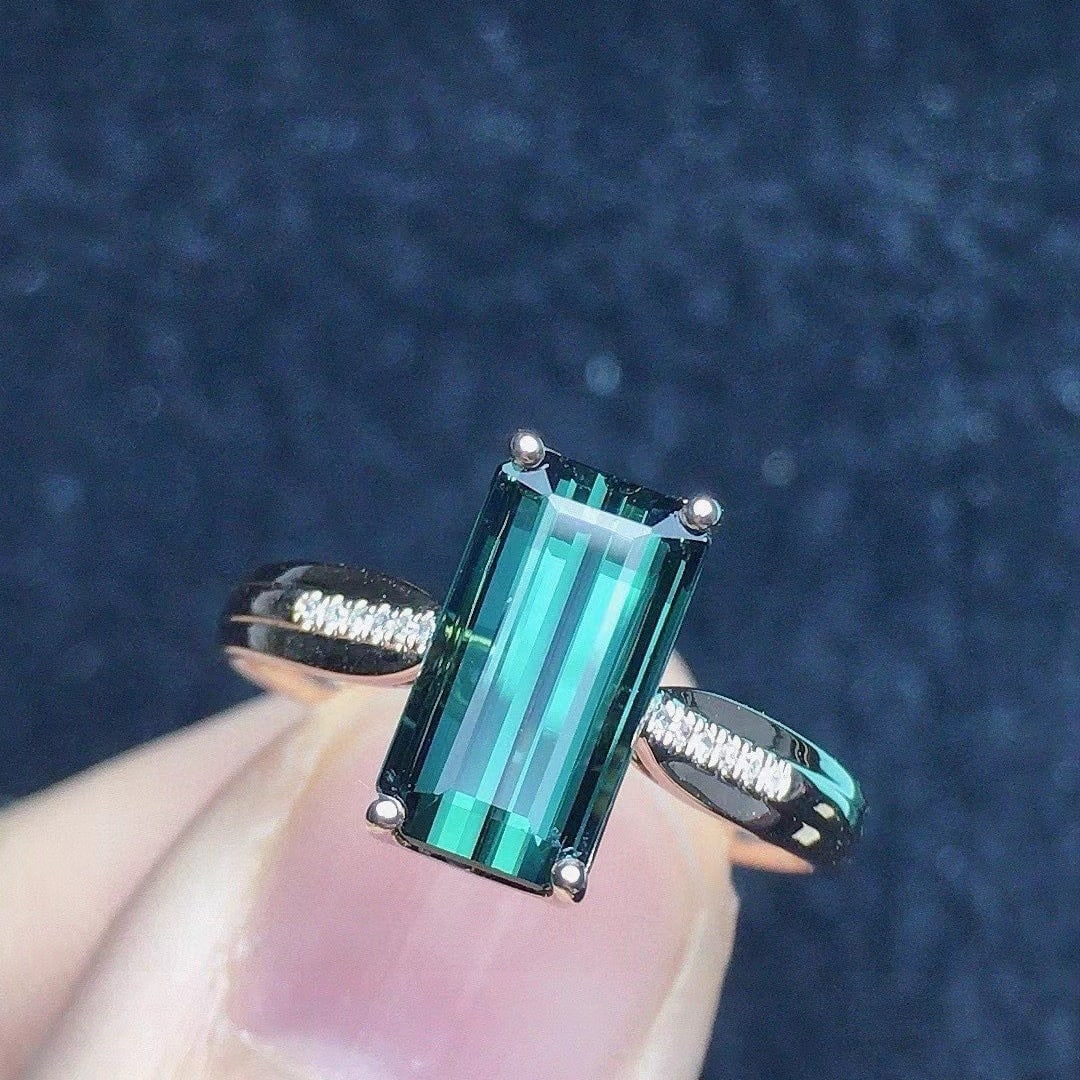 14k Gold 2.58 Ct Natural Tourmaline & Diamond Ring: Ref:231067127 // gold content:14k gold // ring size:7. 25us // // main gemstone:tourmaline // shape:octagonal // carat weight:2. 58ct // color:green // treatment:natural // // adjacent gemstone 2