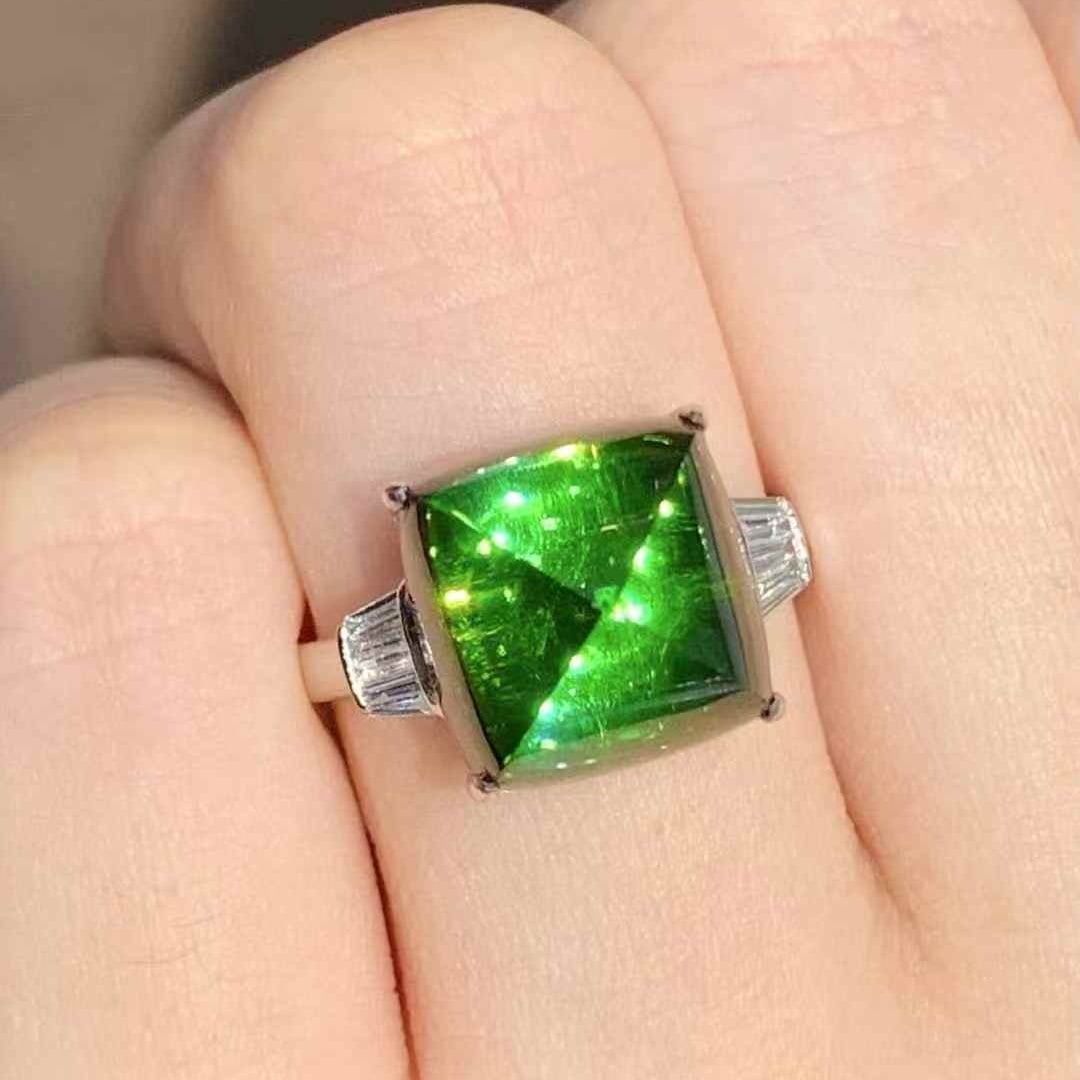 14k Gold 9 Ct Natural Tourmaline & Diamond Ring: Ref:231067166 // gold content:14k gold // ring size:7. 25us // // main gemstone:tourmaline // shape:sugar-loaf // carat weight:9ct // color:green // treatment:natural // // adjacent gemstone 2 :