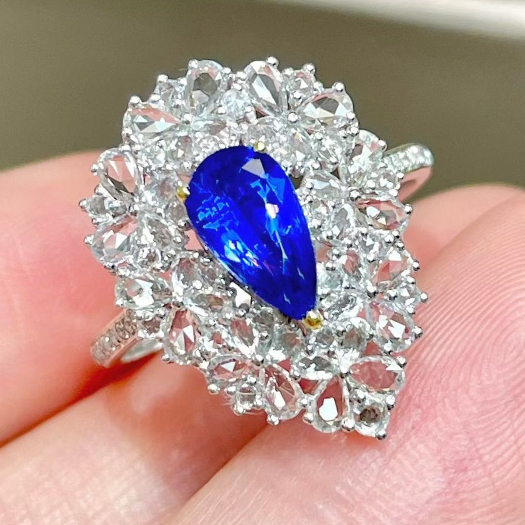 14k Gold 1.11 Ct Natural Sapphire & Sapphire & Diamond Ring: Ref:231067182 // gold content:14k gold // ring size:7. 25us // // main gemstone:sapphire // shape:pear // carat weight:1. 11ct // color:royal blue // treatment:natural // // adjacent gemstone 2 : sapp