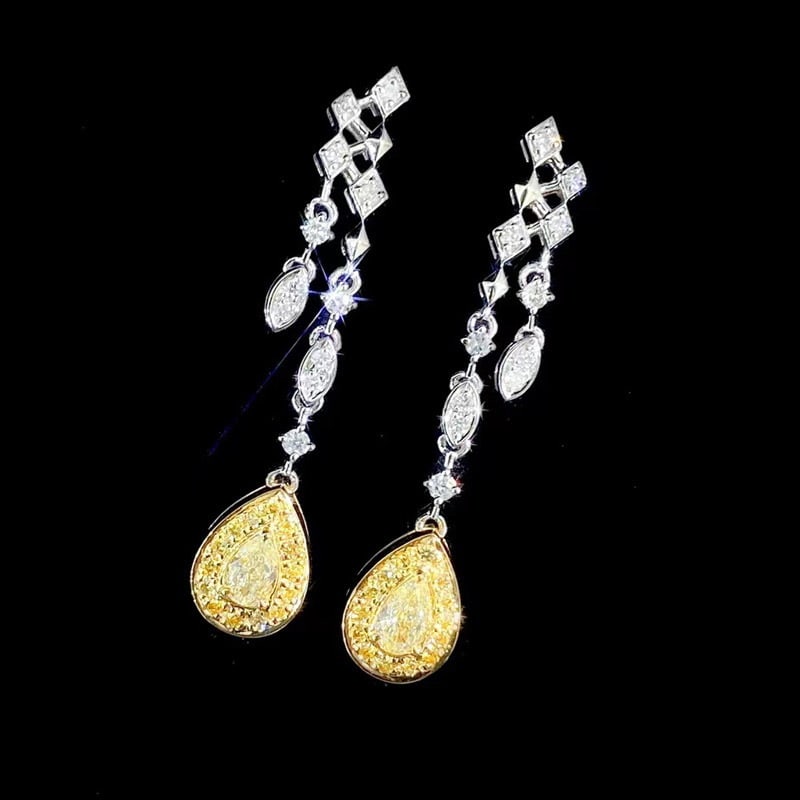 14k Gold 0.48 Ctw Natural Yellow Diamond & Diamond Earrings: Ref:231068012 // gold content:14k gold // main gemstone:yellow diamond // shape:pear // carat weight:0. 22ct // color:yellow // treatment:natural // // adjacent gemstone 2 : diamond // shape:round //
