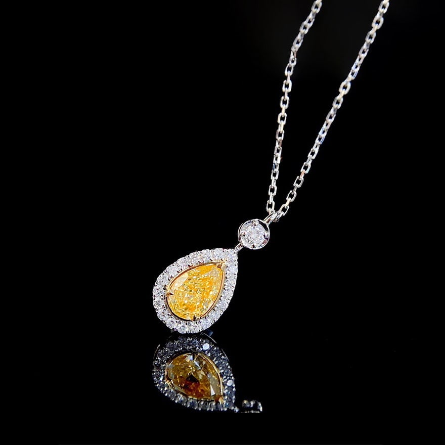 14k Gold 0.94 Ctw Natural Yellow Diamond & Diamond Pendant( Without Chain ): Ref:231068077 // gold content:14k gold // main gemstone:yellow diamond // shape:pear // carat weight:0. 70ct // color:yellow // treatment:natural // // adjacent gemstone 2 : diamond // shape:round