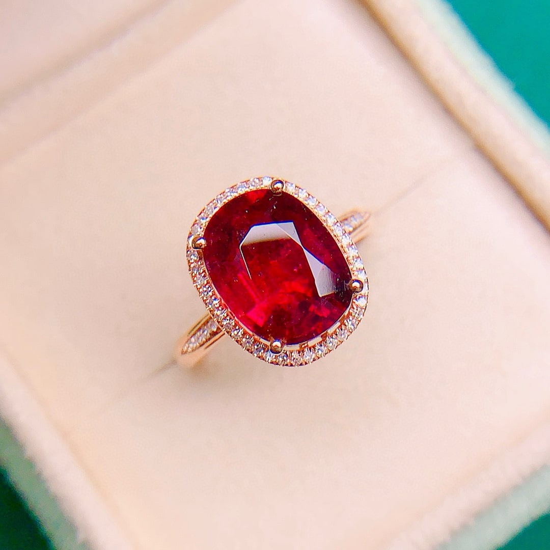 14k Gold 3.90 Ctw Natural Tourmaline & Diamond Ring: Ref:231068084 // gold content:14k gold // ring size:7. 25us // // main gemstone:tourmaline // shape:oval // carat weight:3. 75ct // color:red // treatment:natural // // adjacent gemstone 2 :