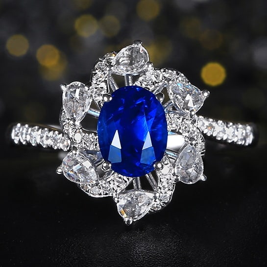 14k Gold 1.90 Ctw Natural Sapphire & Diamond Ring: Ref:231068087 // gold content:14k gold // ring size:7. 25us // // main gemstone:sapphire // shape:oval // carat weight:1. 50ct // color:royal blue // treatment:natural // // adjacent gemstone 2 :
