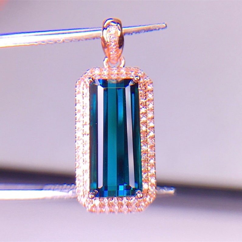14k Gold 4.2 Ct Natural Tourmaline & Diamond Pendant( Without Chain ): Ref:231068108 // gold content:14k gold // main gemstone:tourmaline // shape:octagonal // carat weight:4. 2ct // color:blue // treatment:natural // // adjacent gemstone 2 : diamond // shape:round //
