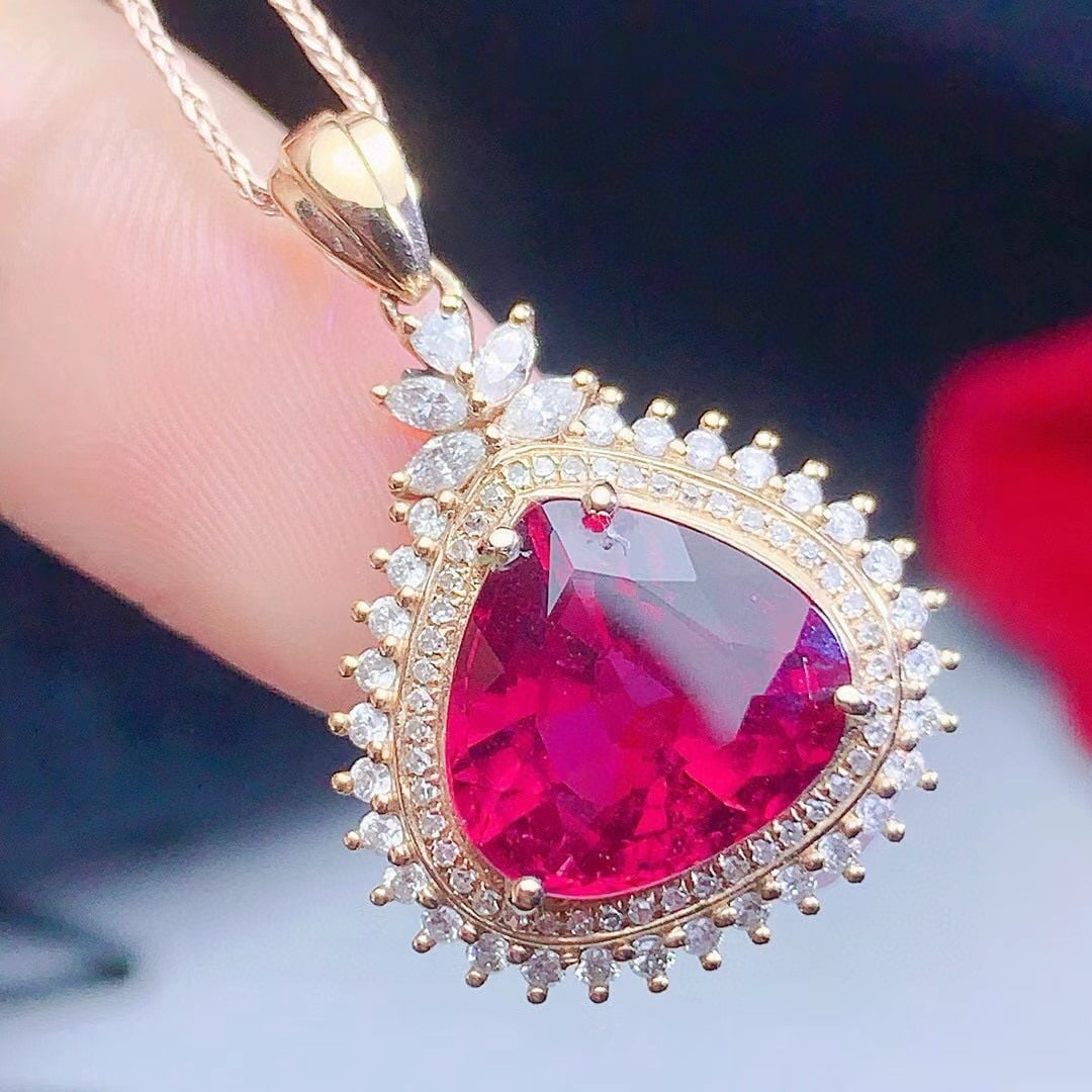 14k Gold 5.45 Ct Natural Tourmaline & Diamond Pendant( Without Chain ): Ref:231068119 // gold content:14k gold // main gemstone:tourmaline // shape:pear // carat weight:5. 45ct // color:red // treatment:natural // // adjacent gemstone 2 : diamond // number of stones:79