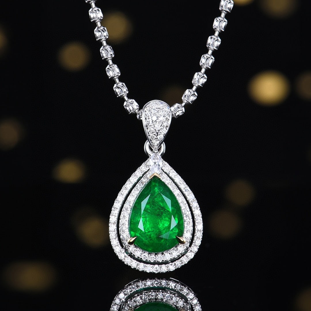 14k Gold 1.71 Ctw Vivid Green Natural Emerald & Diamond Pendant( Without Chain ): Ref:231068286 // gold content:14k gold // main gemstone:emerald // shape:pear // carat weight:1. 5ct // color:vivid green // treatment:natural // // adjacent gemstone 2 : diamond // number of