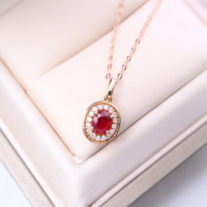 14k Gold 0.64 Ctw Natural Ruby & Diamond Necklace: Ref:231068360 // gold content:14k gold // main gemstone:ruby // shape:oval // carat weight:0. 50ct // color:pigeonblood red // treatment:natural // // adjacent gemstone 2 : diamond // shape:round