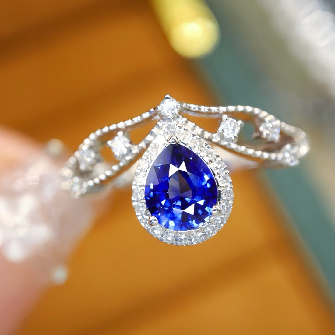 14k Gold 0.93 Ctw Natural Sapphire & Diamond Ring: Ref:231068366 // gold content:14k gold // ring size:7. 25us // // main gemstone:sapphire // shape:pear // carat weight:0. 72ct // color:royal blue // treatment:natural // // adjacent gemstone 2 :