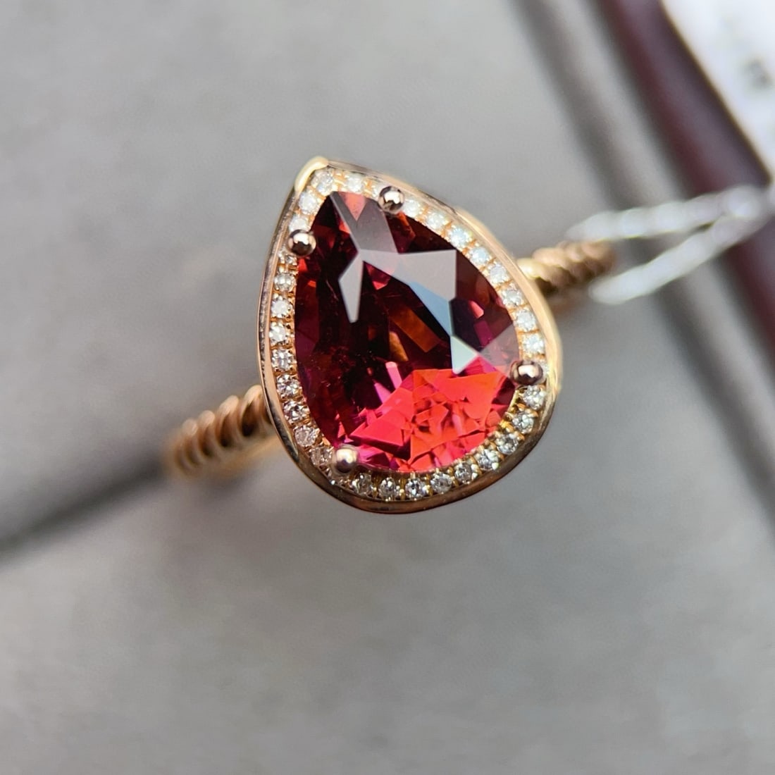 14k Gold 2.9 Ctw Natural Tourmaline & Diamond Ring: Ref:231068370 // gold content:14k gold // ring size:7. 25us // // main gemstone:tourmaline // shape:pear // carat weight:2. 8ct // color:red // treatment:natural // // adjacent gemstone 2 :