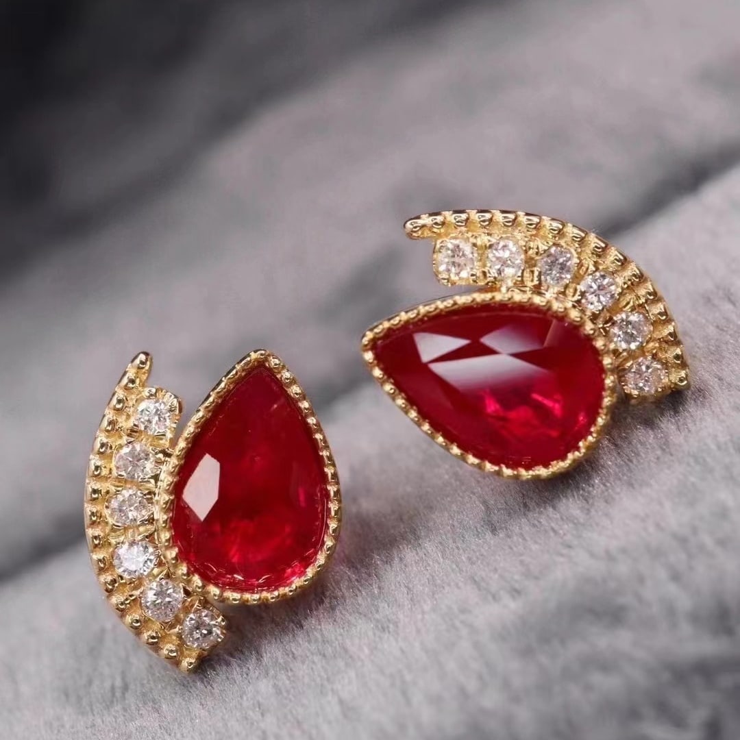 14k Gold 1.16 Ct Natural Ruby & Diamond Earrings: Ref:230969051 // gold content:14k gold // main gemstone:ruby // shape:pear // carat weight:1. 16ct // color:pigeonblood red // treatment:natural // // adjacent gemstone 2 : diamond // shape:round // c