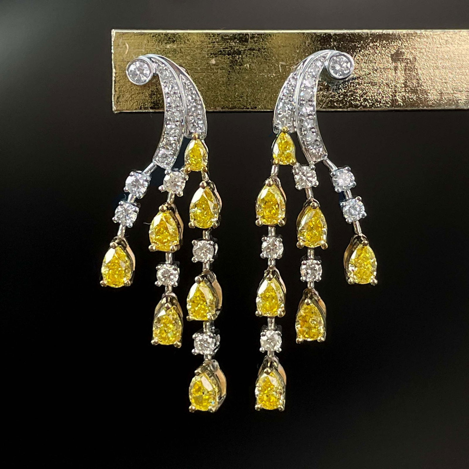 14k Gold 2.53 Ctw Natural Yellow Diamond & Diamond Earrings: Ref:230969056 // gold content:14k gold // main gemstone:yellow diamond // shape:pear // carat weight:1. 94ct // color:yellow // treatment:natural // // adjacent gemstone 2 : diamond // shape:round