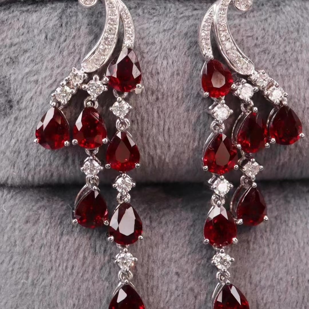 14k Gold 5.80 Ctw Natural Ruby & Diamond Earrings: Ref:230969129 // gold content:14k gold // main gemstone:ruby // shape:pear // carat weight:5. 2ct // color:pigeonblood red // treatment:natural // // adjacent gemstone 2 : diamond // shape:round //
