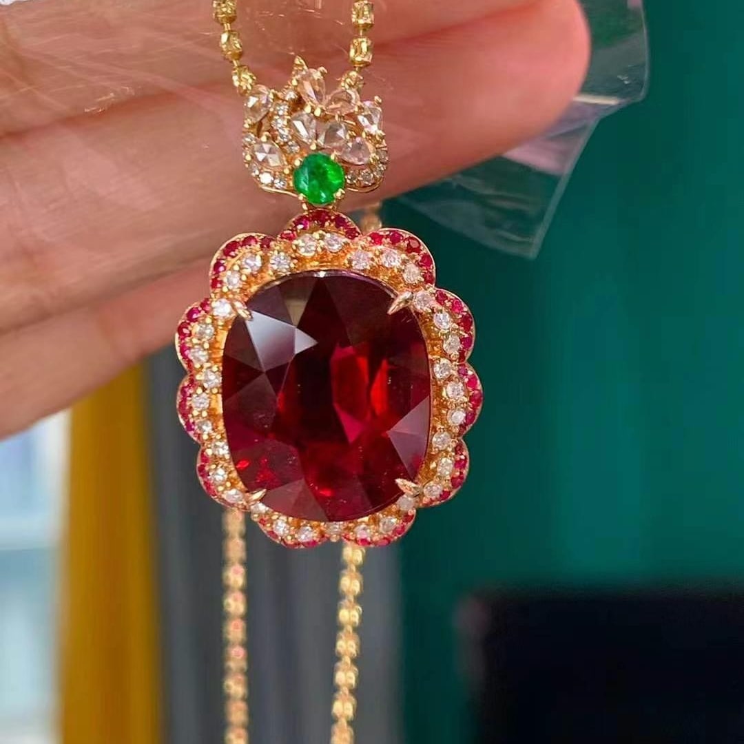 14k Gold 10.88 Ct Natural Tourmaline & Diamond & Emerald & Sapphire & Ruby Pendant( Without Chain ): Ref:230969136 // gold content:14k gold // main gemstone:tourmaline // shape:oval // carat weight:10. 88ct // color:red // treatment:natural // // adjacent gemstone 2 : diamond // shape:round // clarit