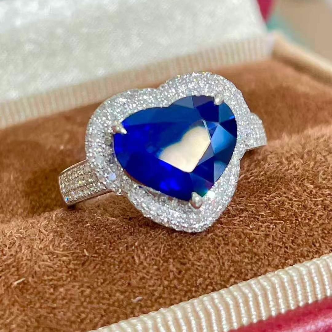 14k Gold 3.1 Ct Natural Sapphire & Diamond Ring: Ref:230969138 // gold content:14k gold // ring size:7. 25us // // main gemstone:sapphire // shape:heart // carat weight:3. 1ct // color:royal blue // treatment:natural // // adjacent gemstone 2 :