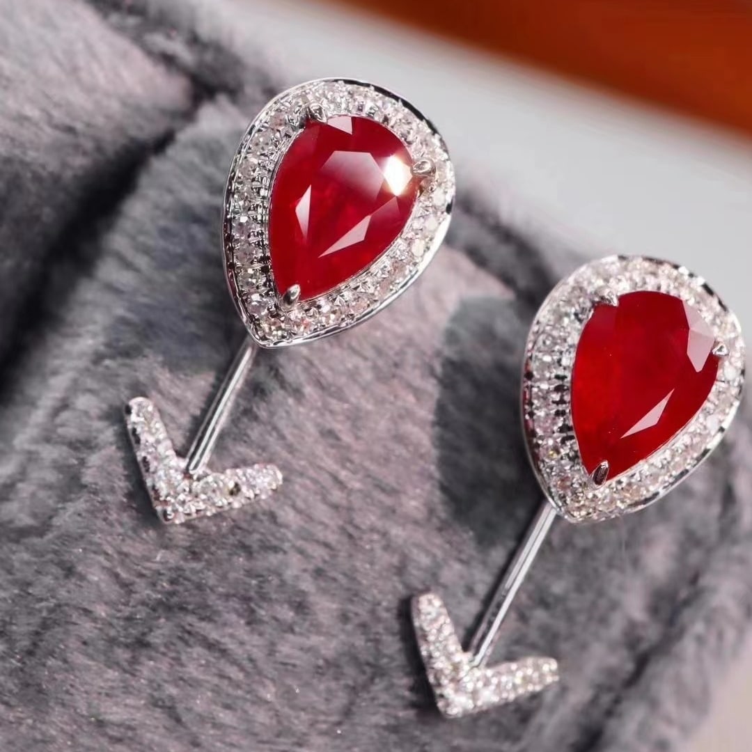 14k Gold 1.35 Ctw Natural Ruby & Diamond Earrings: Ref:230969157 // gold content:14k gold // main gemstone:ruby // shape:pear // carat weight:1. 16ct // color:pigeonblood red // treatment:natural // // adjacent gemstone 2 : diamond // shape:round
