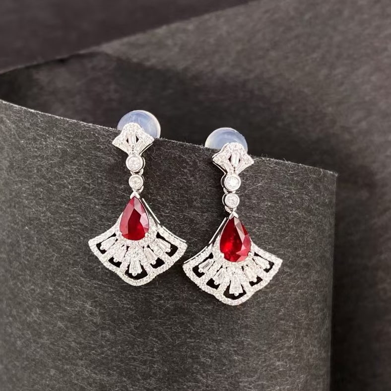 14k Gold 1.04 Ctw Vivid Red Natural Ruby & Diamond Earrings: Ref:230969166 // gold content:14k gold // main gemstone:ruby // shape:pear // carat weight:0. 69ct // color:vivid red // treatment:natural // // adjacent gemstone 2 : diamond // shape:multiply //