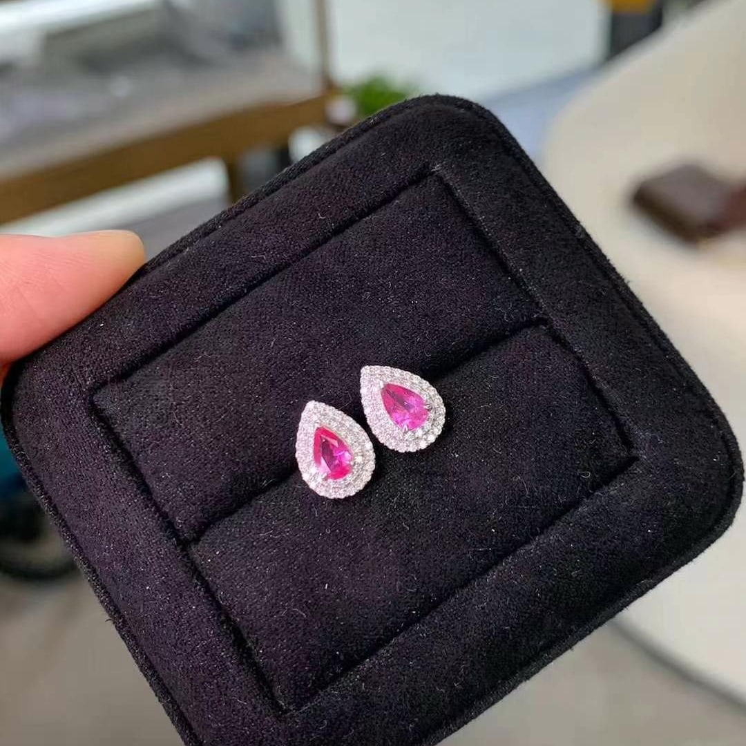14k Gold 0.85 Ctw Natural Padparadscha Sapphire & Diamond Earrings: Ref:230969196 // gold content:14k gold // main gemstone:padparadscha sapphire // shape:pear // carat weight:0. 61ct // color:orangish pink // treatment:natural // // adjacent gemstone 2 : diamond