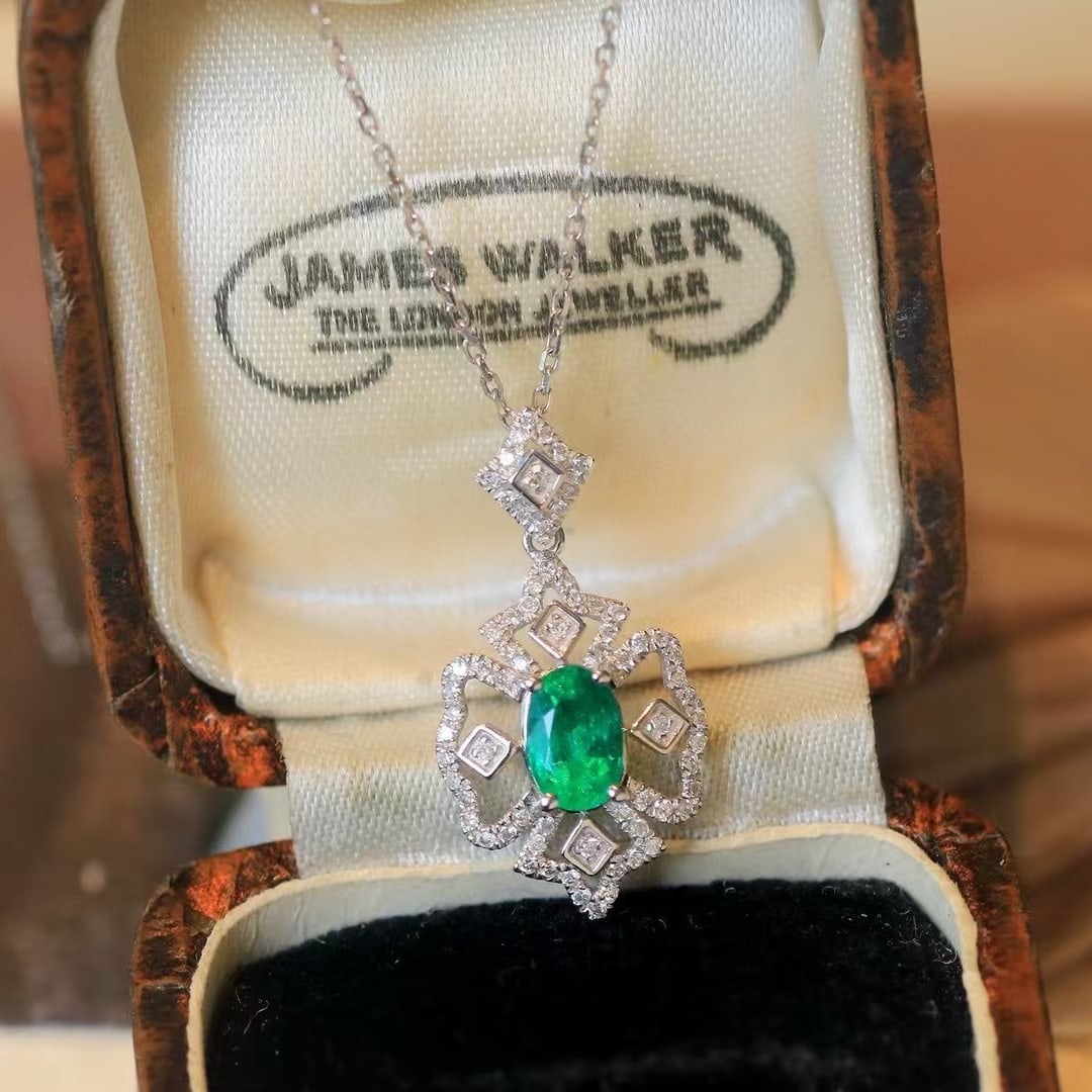 14k Gold 0.76 Ctw Natural Emerald & Diamond Pendant( Without Chain ): Ref:230969201 // gold content:14k gold // main gemstone:emerald // shape:oval // carat weight:0. 55ct // color:green // treatment:natural // // adjacent gemstone 2 : diamond // shape:round // carat