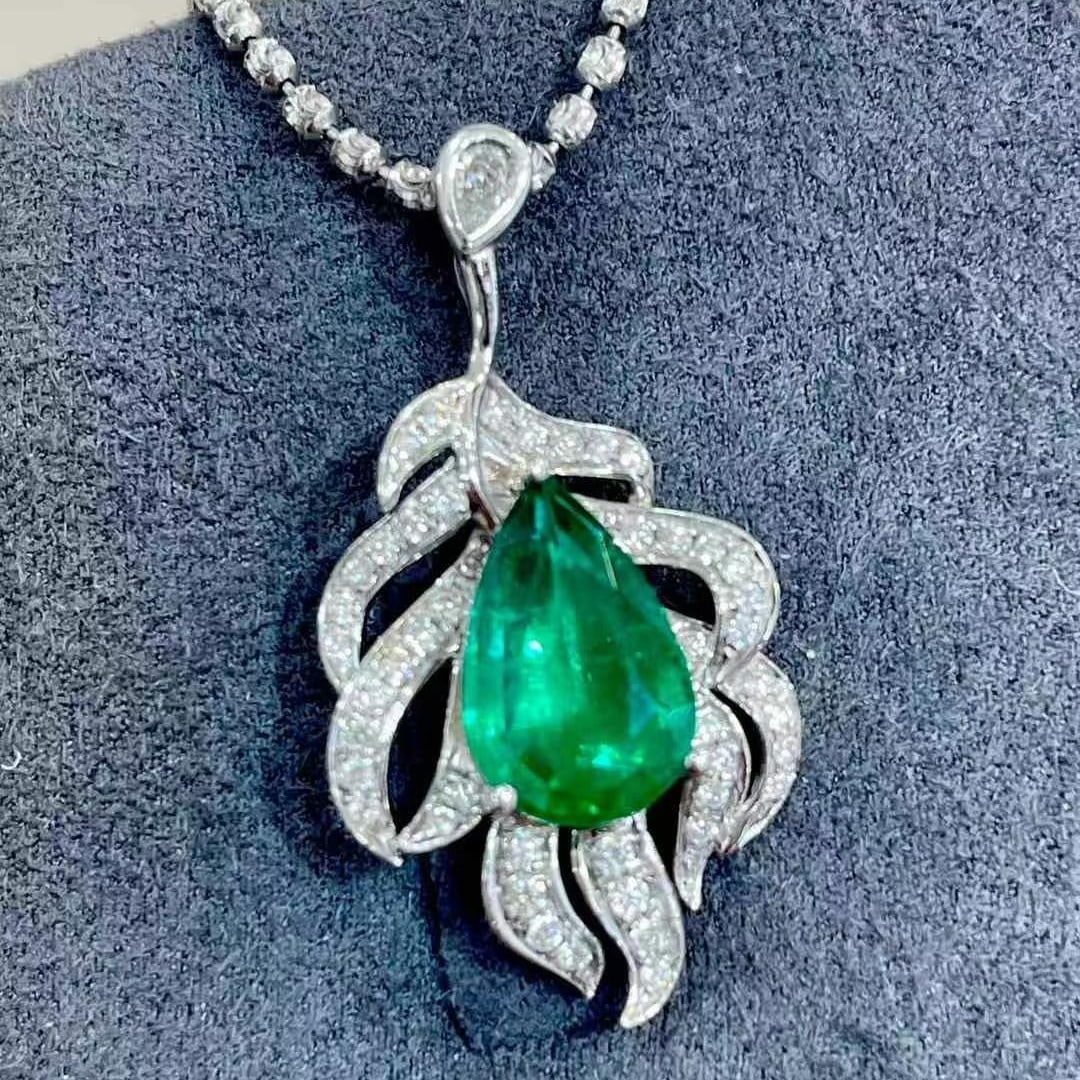 14k Gold 2.05 Ctw Vivid Green Natural Emerald & Diamond Pendant( Without Chain ): Ref:230969210 // gold content:14k gold // main gemstone:emerald // shape:pear // carat weight:1. 8ct // color:vivid green // treatment:natural // // adjacent gemstone 2 : diamond // shape:round //