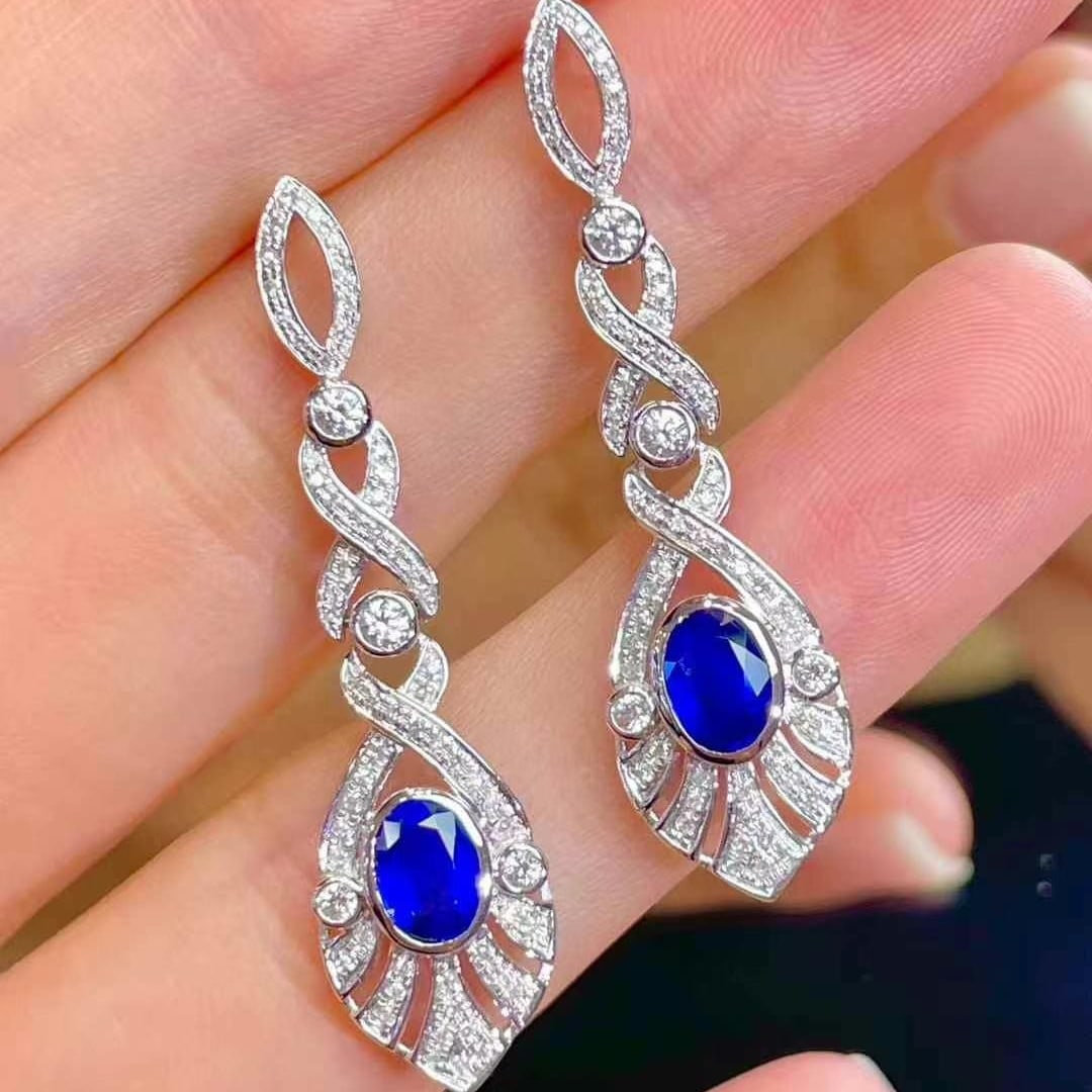 14k Gold 1.3 Ct Natural Sapphire & Diamond Earrings: Ref:230969212 // gold content:14k gold // main gemstone:sapphire // shape:oval // carat weight:1. 3ct // color:royal blue // treatment:natural // // adjacent gemstone 2 : diamond // shape:round // cla