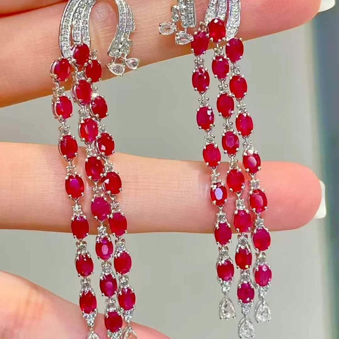 14k Gold 9.56 Ctw Natural Ruby & Diamond Earrings: Ref:230969214 // gold content:14k gold // main gemstone:ruby // shape:oval // carat weight:9. 2ct // color:red // treatment:natural // // adjacent gemstone 2 : diamond // shape:round // carat