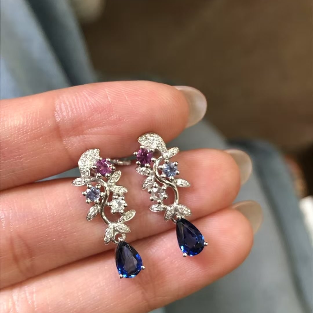 14k Gold 1.35 Ctw Natural Sapphire & Diamond Earrings: Ref:230969217 // gold content:14k gold // main gemstone:sapphire // shape:pear // carat weight:1. 23ct // color:blue // treatment:natural // // adjacent gemstone 2 : diamond // shape:round // carat