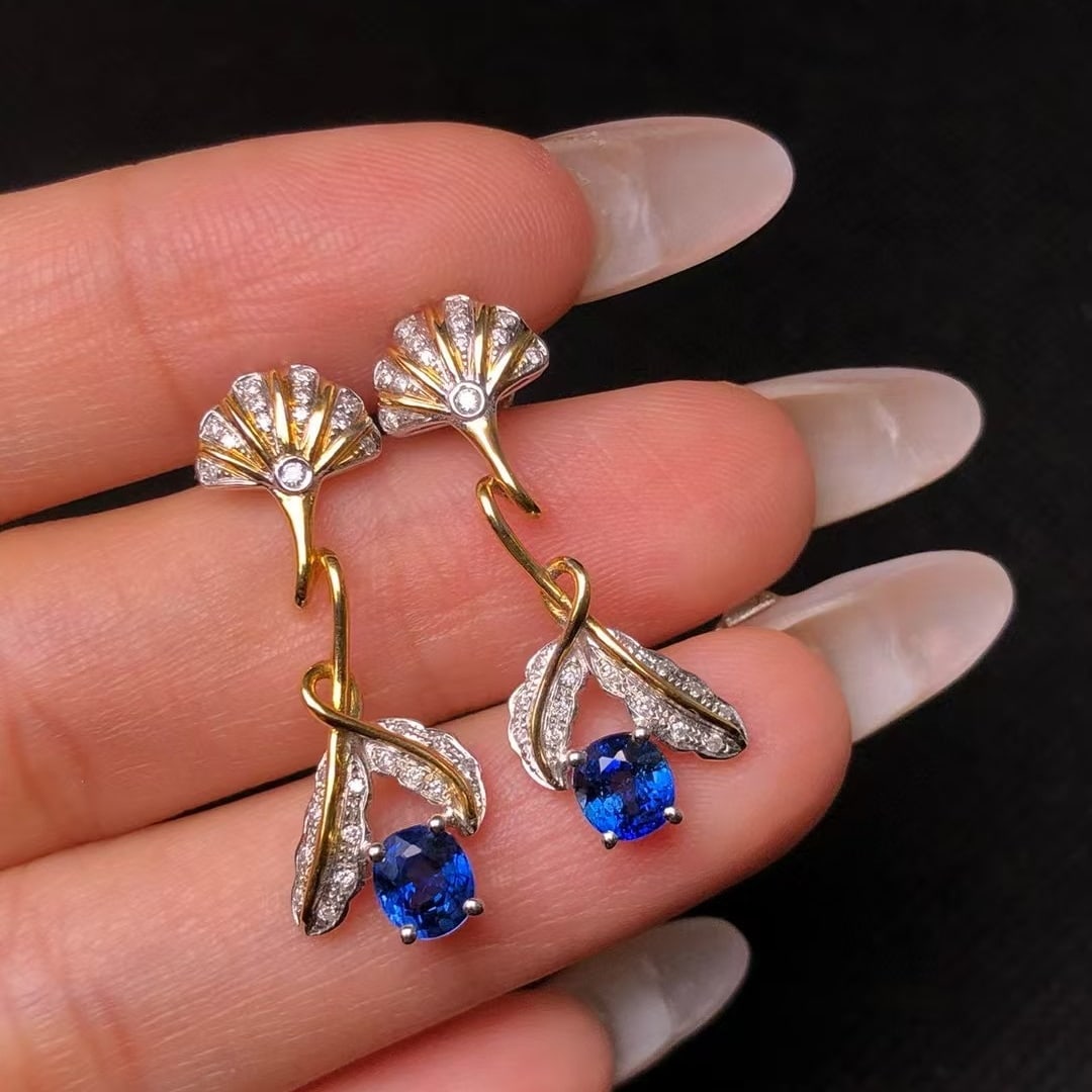 14k Gold 1.45 Ctw Natural Sapphire & Diamond Earrings: Ref:230969231 // gold content:14k gold // main gemstone:sapphire // shape:oval // carat weight:1. 28ct // color:blue // treatment:natural // // adjacent gemstone 2 : diamond // shape:round // carat