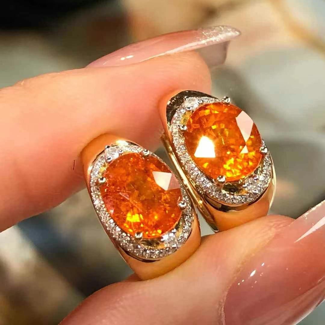 14k Gold 5.35 Ct Natural Spessartine & Diamond Earrings: Ref:230969235 // gold content:14k gold // main gemstone:spessartine // shape:oval // carat weight:5. 35ct // color:orange // treatment:natural // // adjacent gemstone 2 : diamond // shape:round //