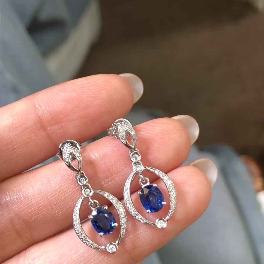 14k Gold 1.67 Ctw Natural Sapphire & Diamond Earrings: Ref:230969252 // gold content:14k gold // main gemstone:sapphire // shape:oval // carat weight:1. 47ct // color:blue // treatment:natural // // adjacent gemstone 2 : diamond // shape:round // carat