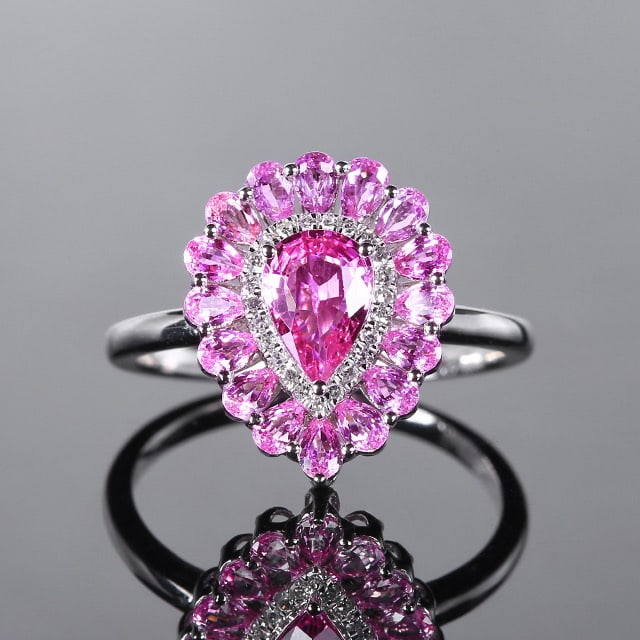 14k Gold 1.91 Ctw Natural Padparadscha Sapphire & Diamond Ring: Ref:230970002 // gold content:14k gold // ring size:7. 25us // // main gemstone:padparadscha sapphire // shape:pear // carat weight:1. 84ct // color:orangish pink // treatment:natural // //