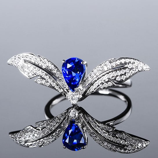 14k Gold 1.47 Ctw Natural Sapphire & Diamond Ring: Ref:230970005 // gold content:14k gold // ring size:7. 25us // // main gemstone:sapphire // shape:pear // carat weight:1. 18ct // color:royal blue // treatment:natural // // adjacent gemstone 2 :