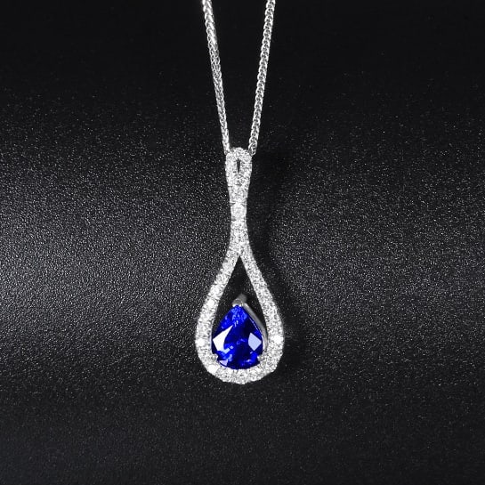 14k Gold 1.46 Ctw Natural Sapphire & Diamond Pendant( Without Chain ): Ref:230970040 // gold content:14k gold // main gemstone:sapphire // shape:pear // carat weight:1. 14ct // color:royal blue // treatment:natural // // adjacent gemstone 2 : diamond // number of