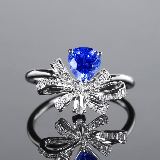 14k Gold 1.43 Ctw Natural Sapphire & Diamond Ring: Ref:230970062 // gold content:14k gold // ring size:7. 25us // // main gemstone:sapphire // shape:pear // carat weight:1. 22ct // color:cornflower blue // treatment:natural // // adjacent gemstone