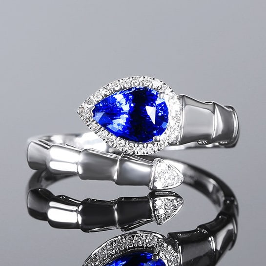 14k Gold 1.11 Ctw Natural Sapphire & Diamond Ring: Ref:230970080 // gold content:14k gold // ring size:7. 25us // // main gemstone:sapphire // shape:pear // carat weight:1. 02ct // color:royal blue // treatment:natural // // adjacent gemstone 2 :