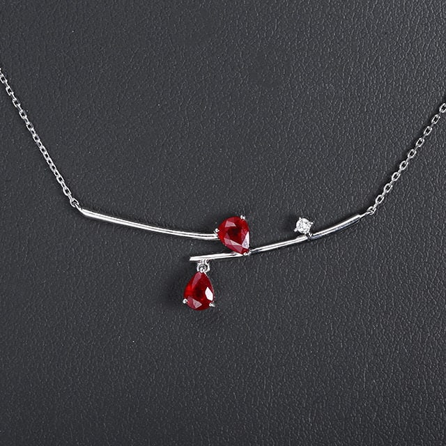 14k Gold 0.65 Ctw Natural Ruby & Diamond Necklace: Ref:230970109 // gold content:14k gold // main gemstone:ruby // shape:pear // carat weight:0. 63ct // color:red // treatment:natural // // adjacent gemstone 2 : diamond // number of stones:1 //